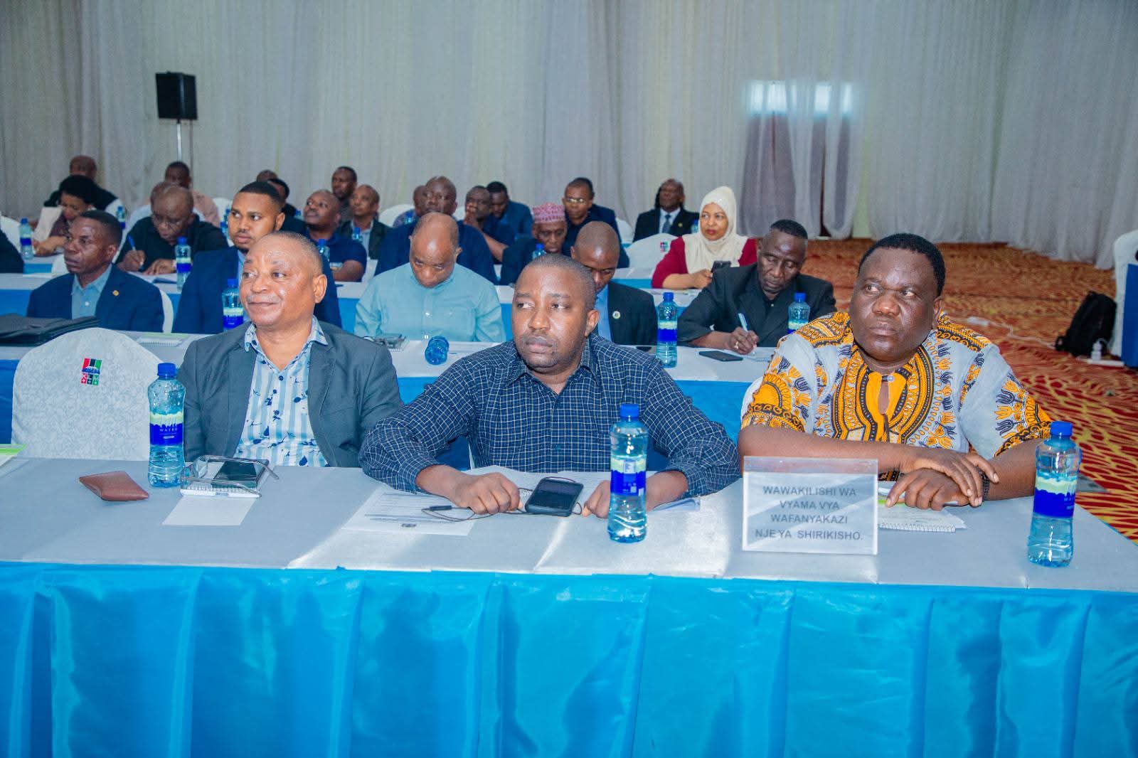 TPTU Secretary General attending a meeting with Minister Deus Sangu in Dodoma.